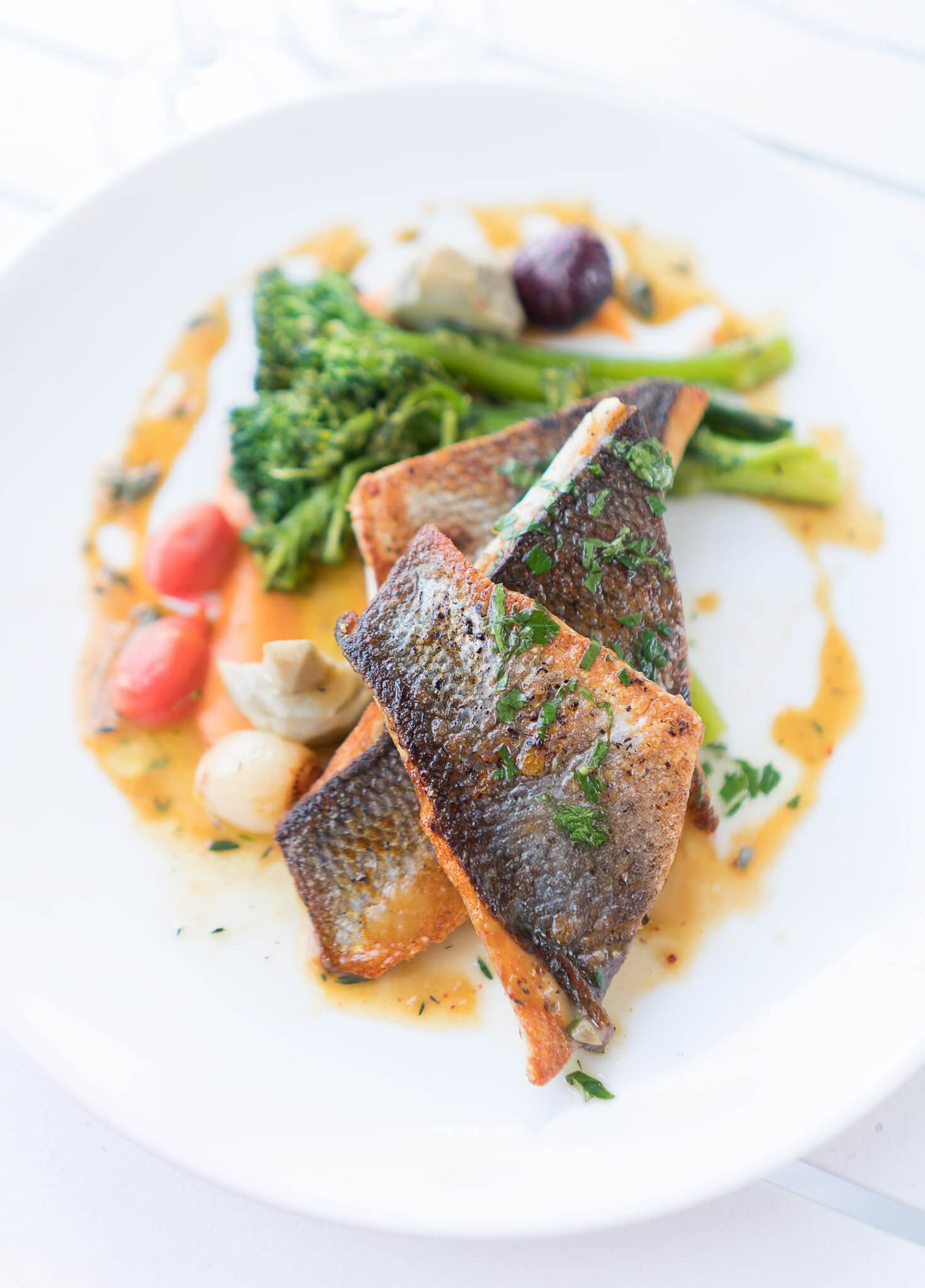 Grilled branzino fish steaks